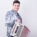 Святослав Шершуков в фотосессии с гармониками